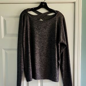 Undeamour Heather Gray Long Sleeve Top. Has Crisscross Keyhole Back &Thumb Slits